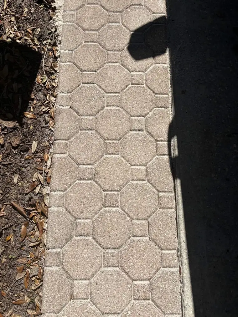 After: octagon paver walkway pressure washing by Waddle Works